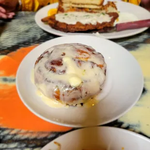 Cinnamon Roll, chicken fried steak and chorizo omlete. Very yummy.left with a hapoy and full tummy