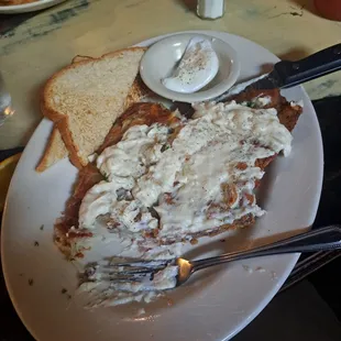 Chicken fried steak eggs and toast