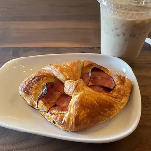 Ham and Asiago croissant and iced latte