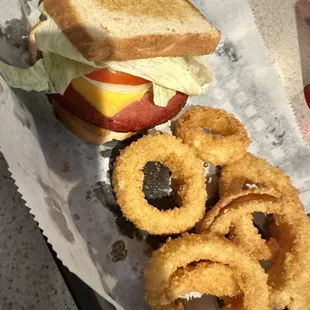 Fully dressed FRIED BOLOGNA SANDWICH with Onion Rings. Delicious!!!