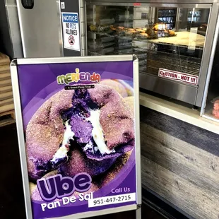 a sign for a doughnut shop