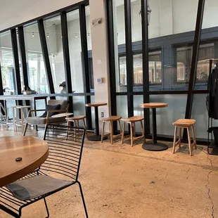tables and chairs in a coffee shop