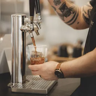 a bari serving a drink