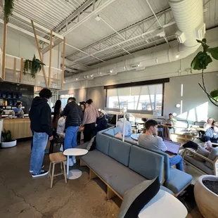 a group of people in a coffee shop