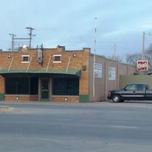 a car parked in front of a building