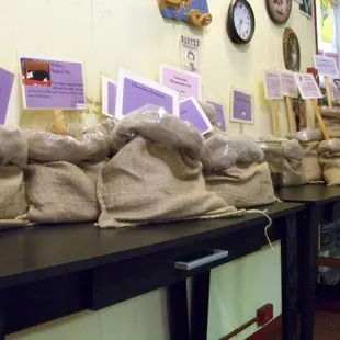 bags of fresh coffee, roasted on the premises