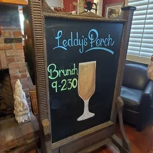 a chalk board with a sign for a cocktail