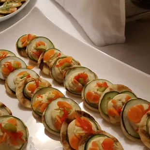 Lemongrass and Ginger Hummus on grilled pita rounds with fresh veggies