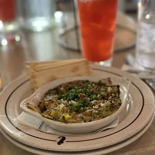 a plate of food and a drink