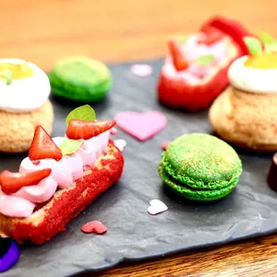 Mother&apos;s Day: Clockwise-mango-passion choux pastry (MPCP), green tea macaron (GTM), strawberry eclair (SE), MPCP, truffle, GTM, SE