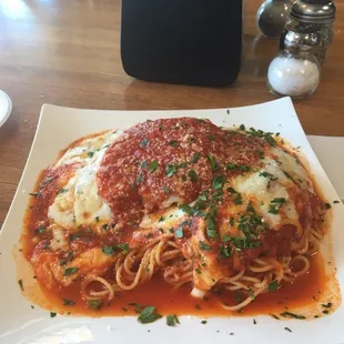 Veal Parmesan and a salad.