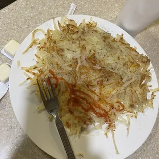 Side of hash browns? Umm...huge dinner plate of hash browns