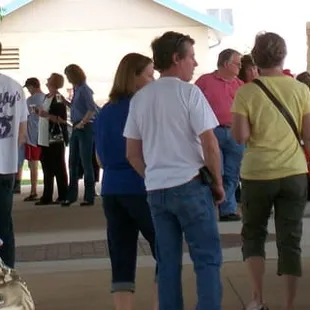 a crowd of people shopping