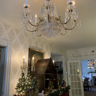a chandelier and christmas tree