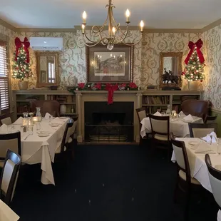dining room with fireplace and christmas decorations