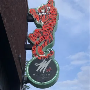 a neon sign for a restaurant