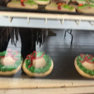 a display of decorated cookies