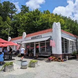 Outside. Storefront. Front patio. There&apos;s a back patio too.