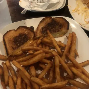 Cheesy grilled cheese with seasoned fries