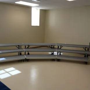 The music room has a mini stage and drums and a piano! (during open house)