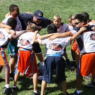 MSC's flag football team in a huddle before a game