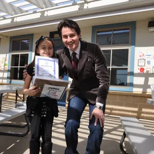 MSC student recieves an award and a prize for her high score in an online World Maths Day competition.