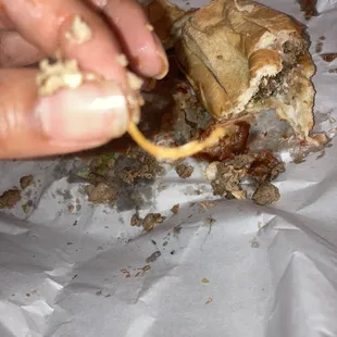 a person eating a sandwich