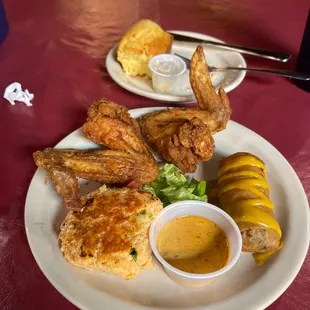 Soul food egg roll, crab cakes fried chicken cornbread
