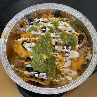 Nachos with chicken. This is fully customized like they do all their food. That&apos;s part of why it&apos;s so good!