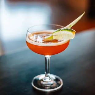 a cocktail in a coupe glass