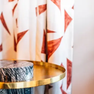 a side table with a marble top