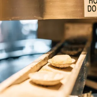 donuts on a conveyor belt