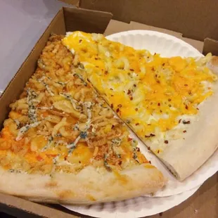 a slice of pizza in a cardboard box