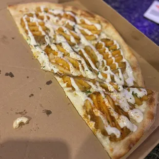 a slice of pizza in a box