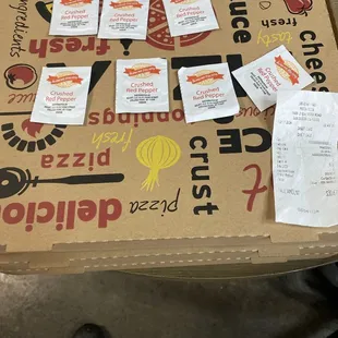7 packs of crushed pepper and 3 pizzas worth 30 bucks