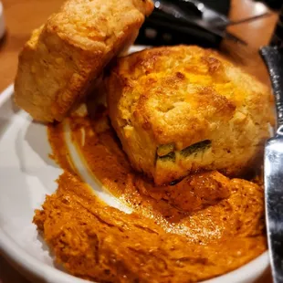 Green chile cheddar biscuits with red chile butter