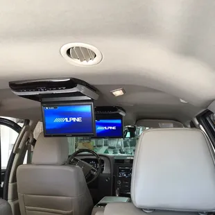 Two Alpine drop down video systems for the Navigator.