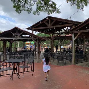 a little girl in a white dress