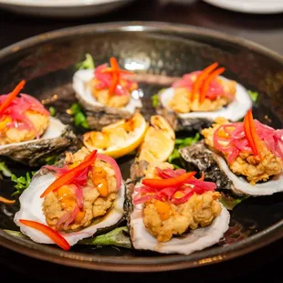 a plate of fresh oysters