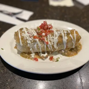 a plate of enchiladas on a table