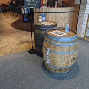 Hand sanitizer and QR code for the menu