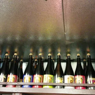 a row of bottles on a shelf