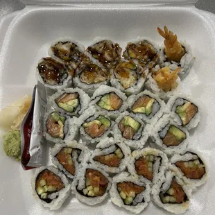 Top to bottom: shrimp tempura roll, salmon avocado roll, and spicy tuna roll