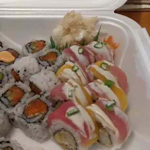 Spicy salmon roll and fla mango roll (after we ate a few pieces)