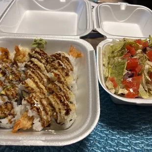 My carry out today...a house salad with ginger dressing, a shrimp tempura roll and a Lincoln roll