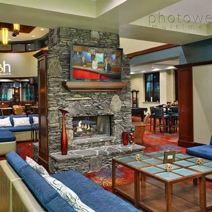 a living room with a fireplace