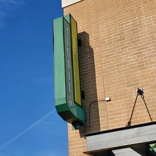 a sign on the side of a building