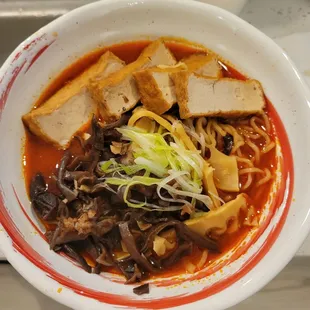 Spicy mala ramen with braised tofu (to go, this is in my own bowl).
