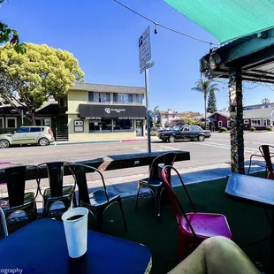 a view of a street from a cafe