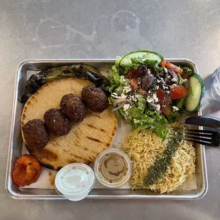 a tray of food and a drink